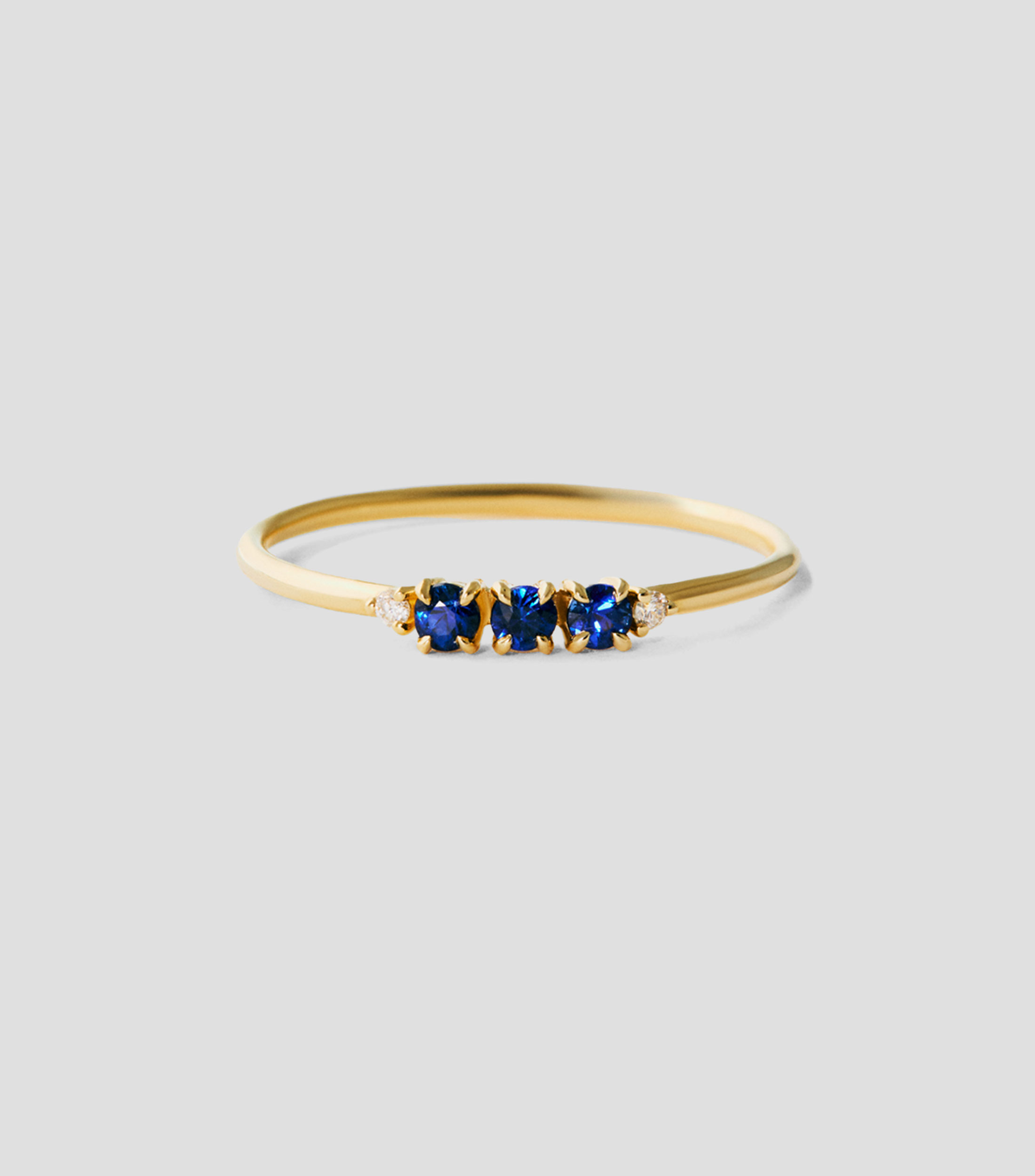 Anillo en Oro amarillo de 9 Kilates con zafiros y diamantes Mujer